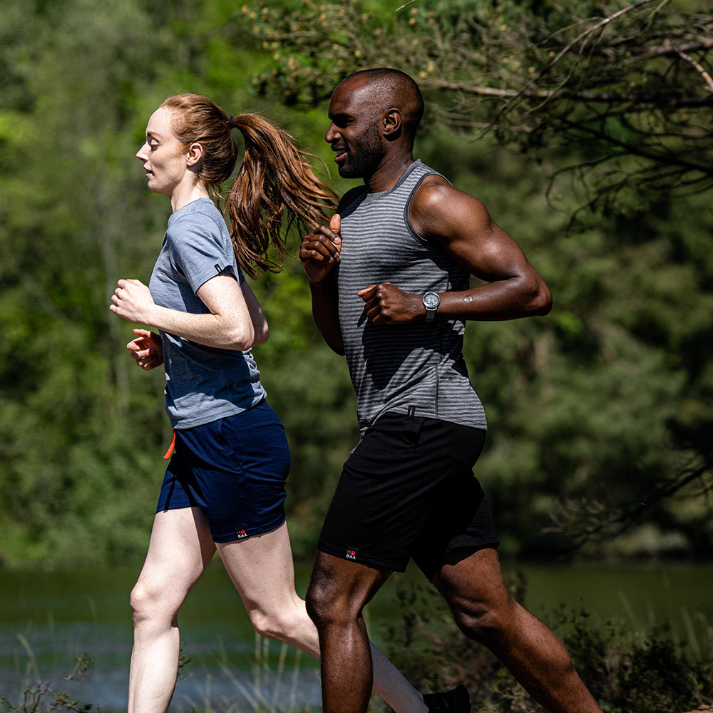 Isobaa | Mens Merino 150 Vest (Mini Stripe Smoke/Charcoal) | Be ready for any adventure with Isobaa's superfine Merino sleeveless Vest. | Model: Michael