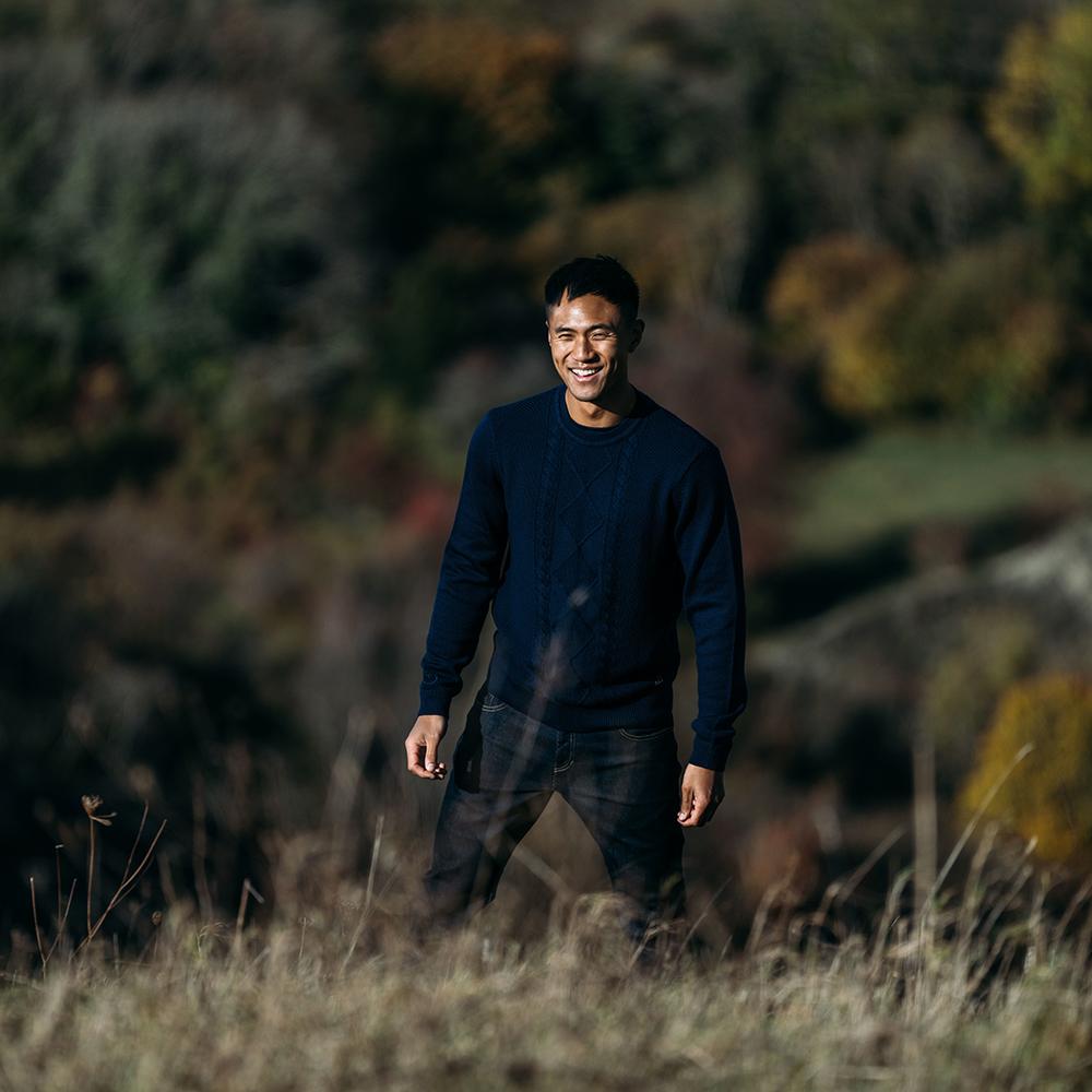 Isobaa | Mens Merino Cable Sweater (Navy) | Experience timeless style and outdoor-ready performance with our Merino wool crew neck sweater. | Model: Donald