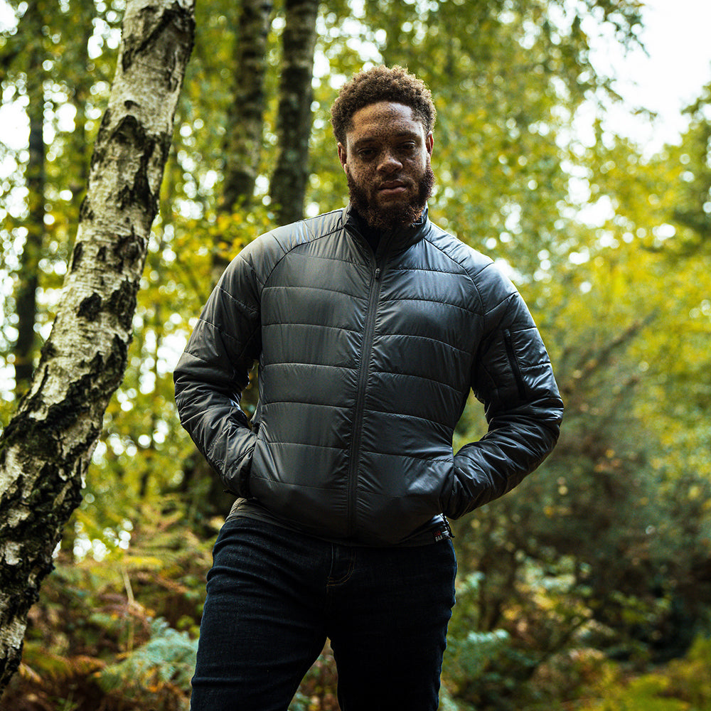 Isobaa | Mens Packable Insulated Jacket (Smoke/Black) | Exceptional warmth, packable convenience, and sustainable design with our lightweight Merino wool jacket. | Model: Shaquille
