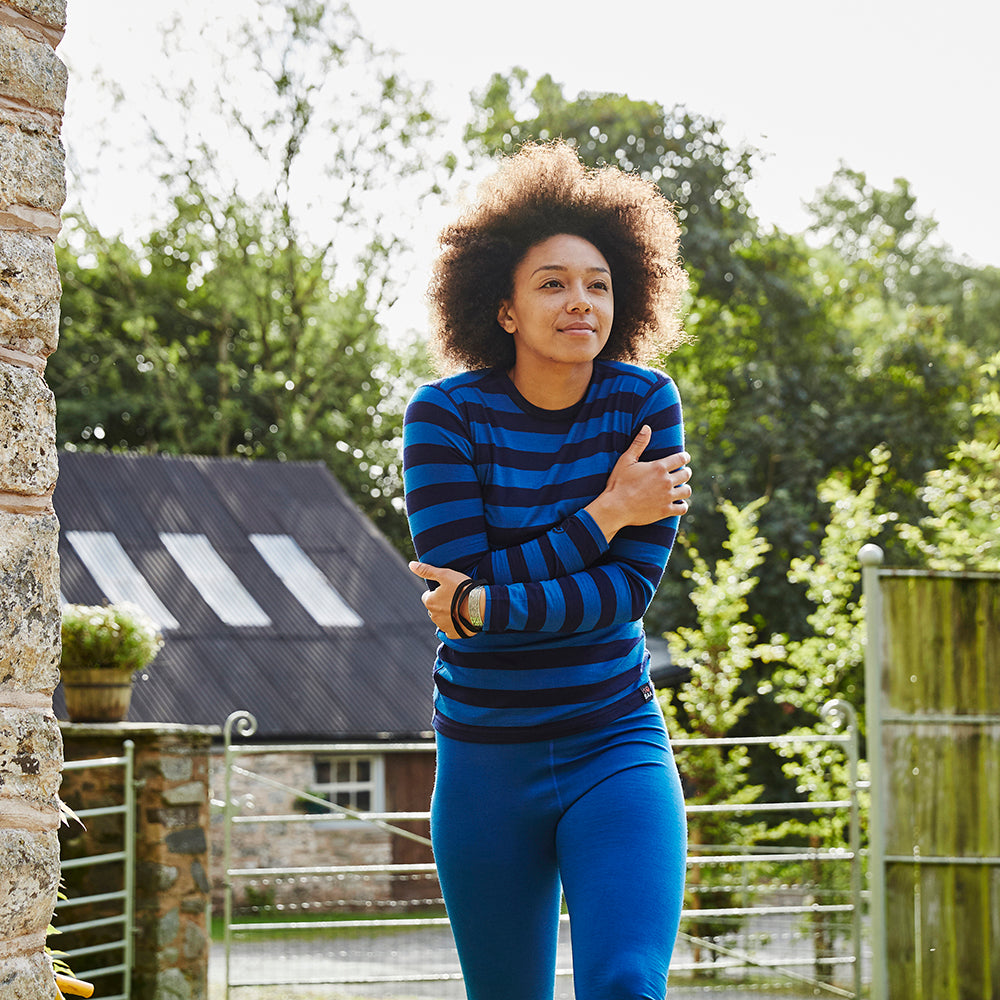 Isobaa | Womens Merino 200 Tights (Blue) | Conquer mountains, ski slopes, and sofa days with unmatched comfort in our 200gm Merino wool tights. | Model: Savanah