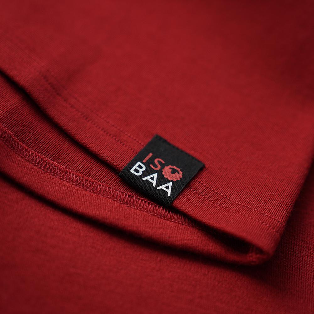 Isobaa | Womens Merino 320 Long Sleeve Half Zip (Red/Orange) | Conquer cold trails, blustery commutes, and unpredictable weather with the ultimate Merino wool half-zip top.
