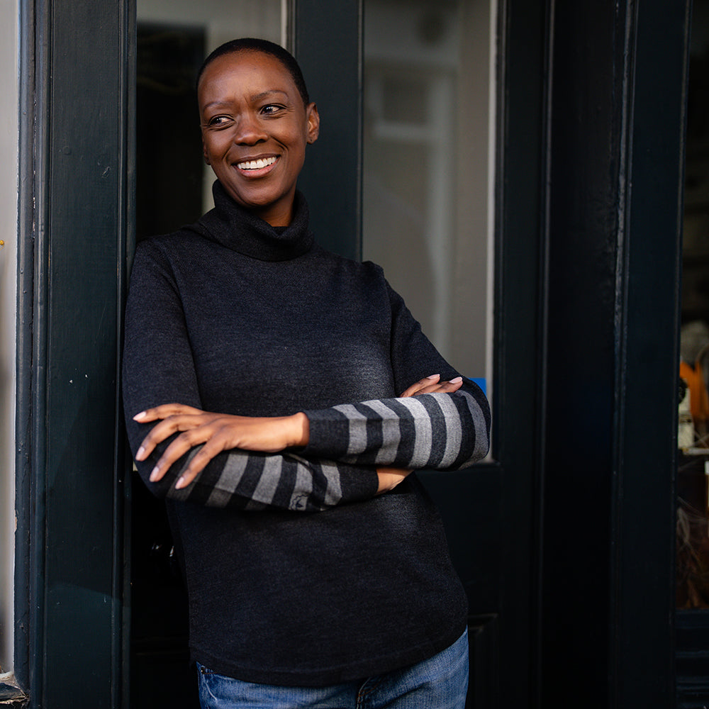 Isobaa | Womens Merino Roll Neck Sweater (Black/Smoke) | Discover premium style and performance with Isobaa's extra-fine Merino roll neck sweater. | Model: Yolisa
