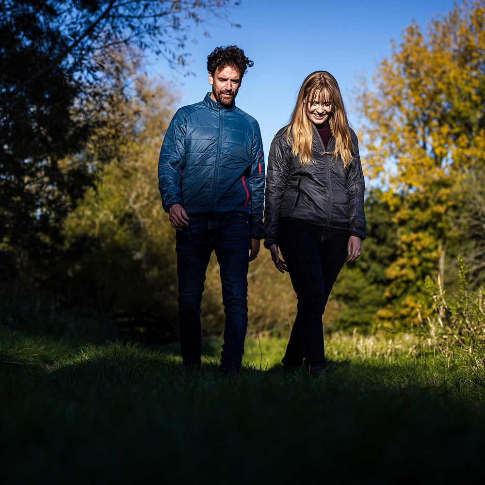 Isobaa | Womens Packable Insulated Jacket (Smoke/Black) | Exceptional warmth, packable convenience, and sustainable design with our lightweight Merino wool jacket. | Model: Natasha
