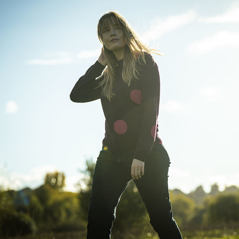 Isobaa | Womens Polka Dot Sweater (Wine/Fuchsia) | Discover the ultimate layering essential with Isobaa's extra-fine Merino crew neck sweater. | Model: Natasha
