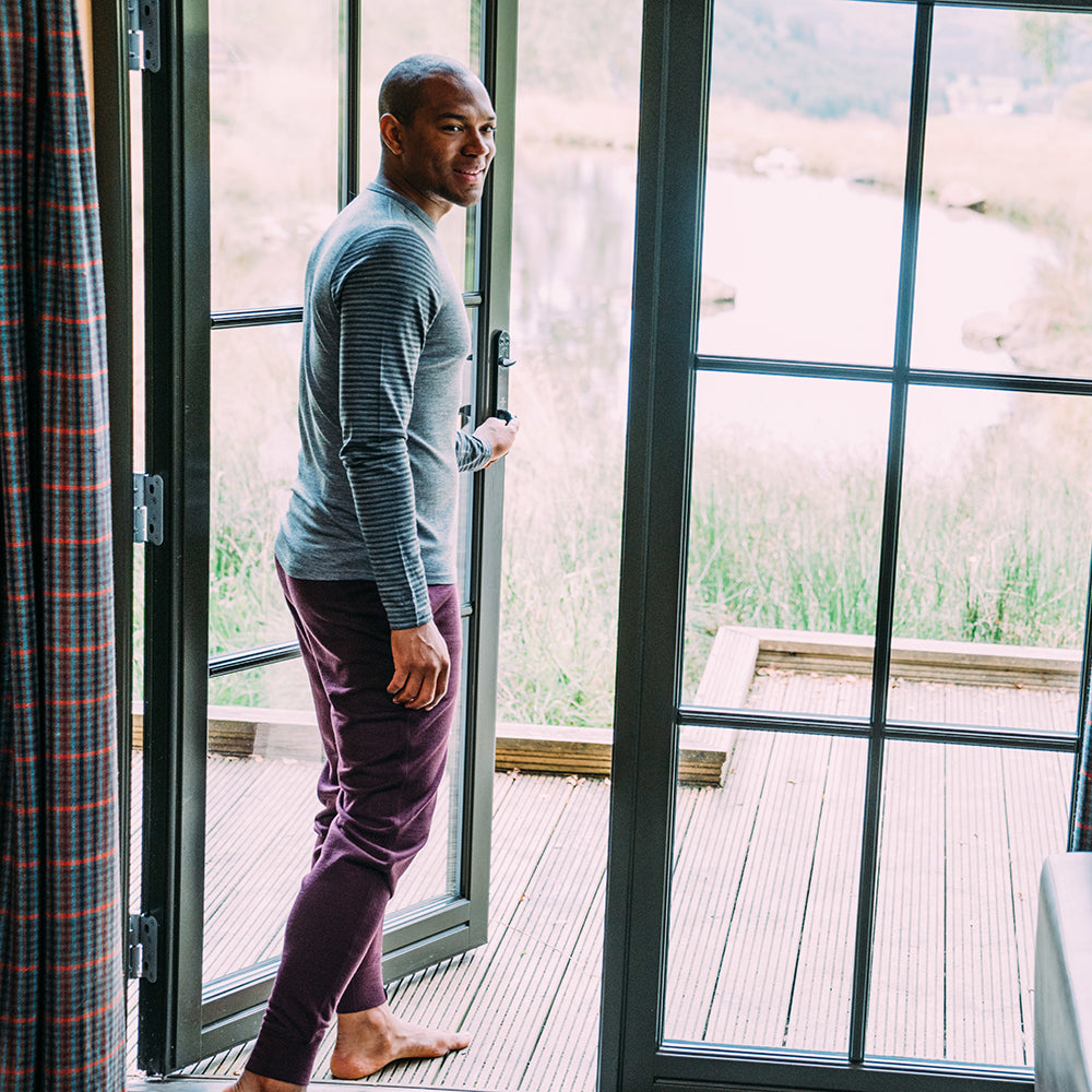 Isobaa | Mens Merino 260 Lounge Cuffed Joggers (Wine/Navy) | Discover unparalleled comfort and versatility with our luxurious 260gm Merino wool lounge joggers. | Model: Edirin