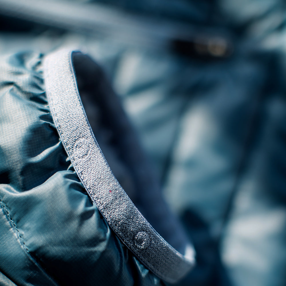 Isobaa | Mens Merino Wool Insulated Jacket (Petrol/Sky) | Innovative and sustainable design with our Merino jacket.