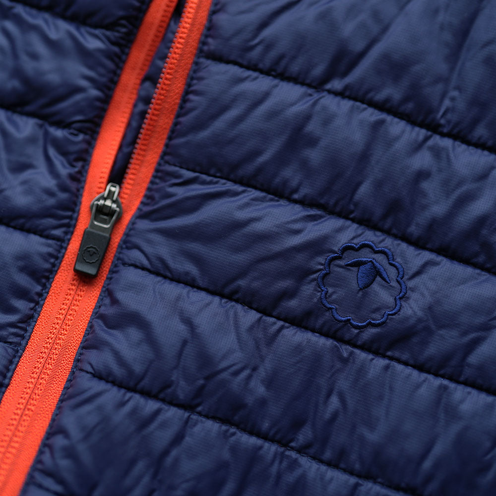 Isobaa | Womens Merino Wool Insulated Gilet (Navy/Orange) | Fight the chill with our innovative Merino gilet.