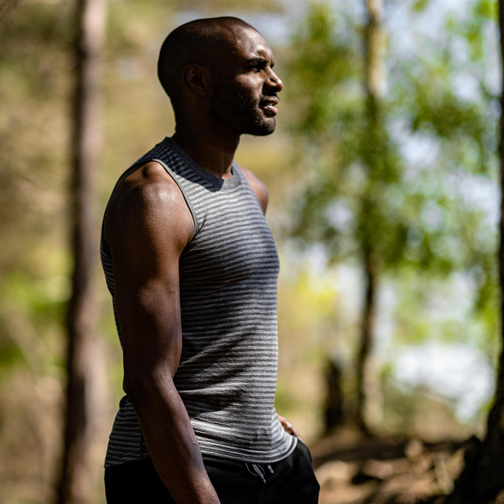 Isobaa | Mens Merino 150 Vest (Mini Stripe Smoke/Charcoal) | Be ready for any adventure with Isobaa's superfine Merino sleeveless Vest. | Model: Michael