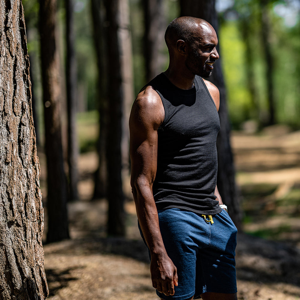 Isobaa | Mens Merino 150 Vest (Black) | Be ready for any adventure with Isobaa's superfine Merino sleeveless Vest. | Model: Michael