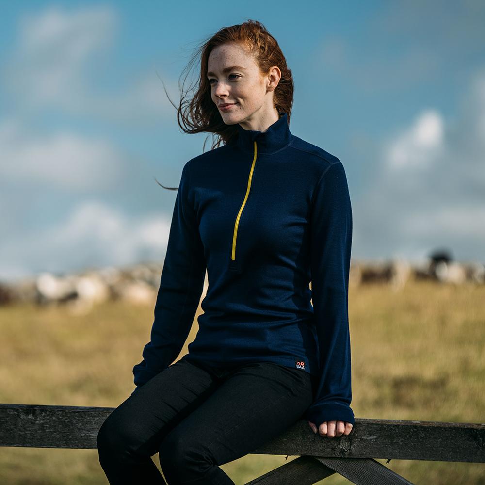 Isobaa | Womens Merino 320 Long Sleeve Half Zip (Navy/Lime) | Conquer cold trails, blustery commutes, and unpredictable weather with the ultimate Merino wool half-zip top. | Model: Sophie