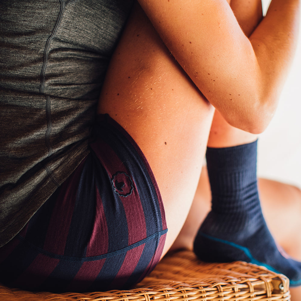 Isobaa | Womens Merino 180 Hipster Shorts (Navy/Wine) | Conquer any activity in comfort with Isobaa's superfine Merino hipster shorts. | Model: Jess
