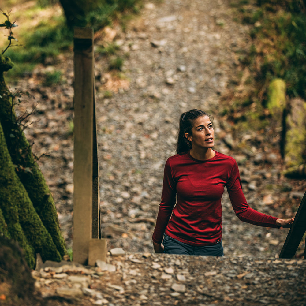 Isobaa | Womens Merino 180 Long Sleeve Crew (Red) | Get outdoors with the ultimate Merino wool long-sleeve top. | Model: Jess
